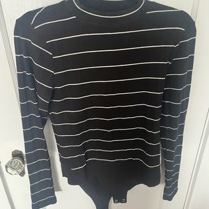 Black and white fitted body suit